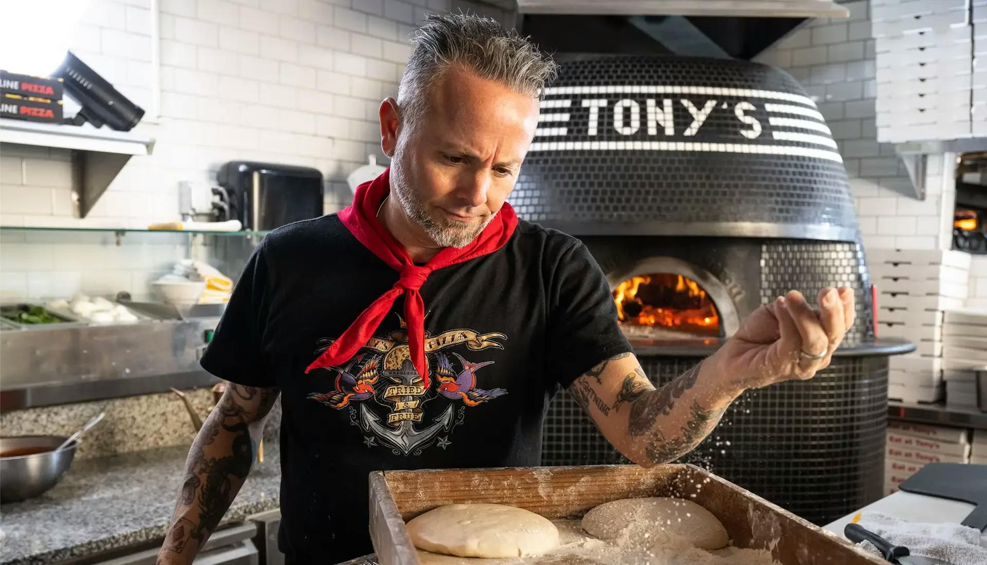 Tony making a pizza tpn